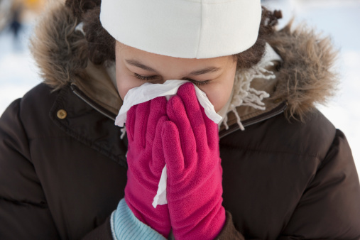 girl sneezing